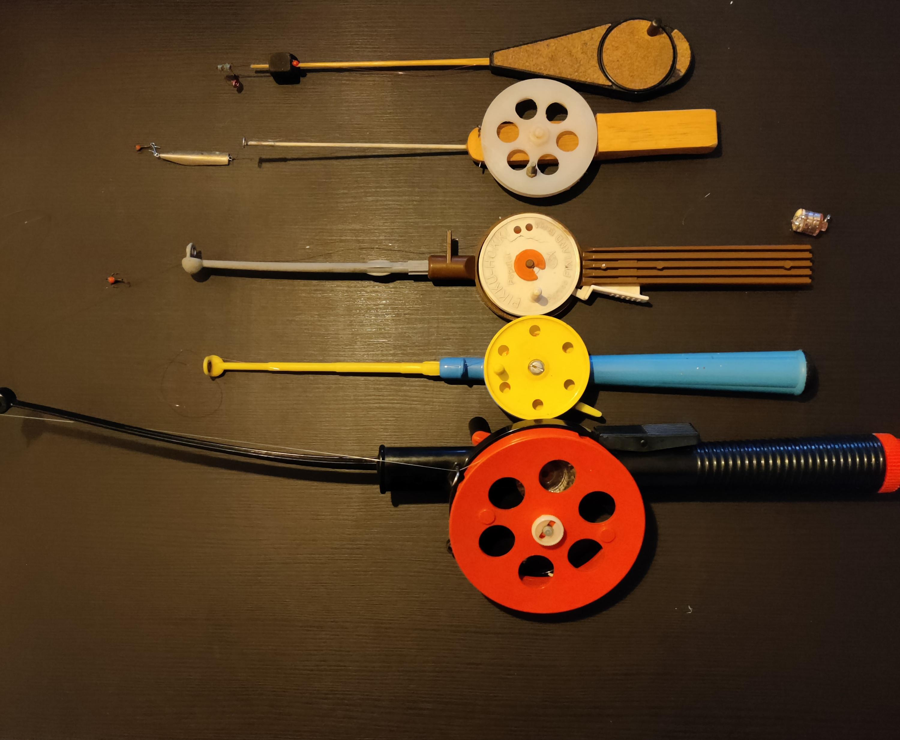 Collection of vintage fishing rods and reels