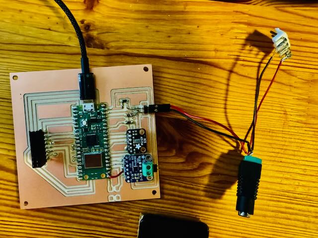 PCB V2 Fully Assembled showing Raspberry Pi Pico W, MAX98357 amplifier, and HUB75 connector
