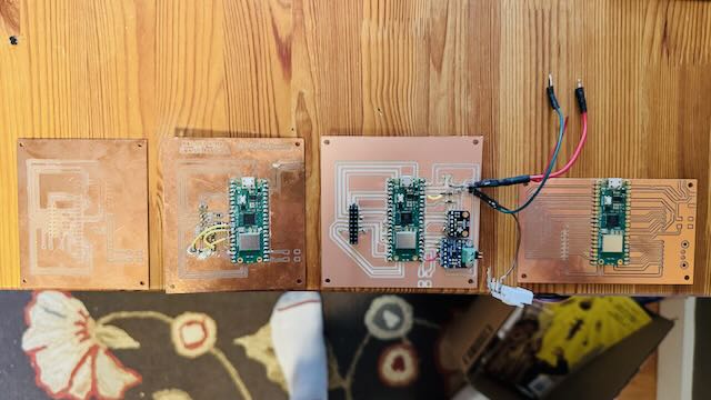 Four versions of SmartPi PCB showing design evolution from prototype to final version