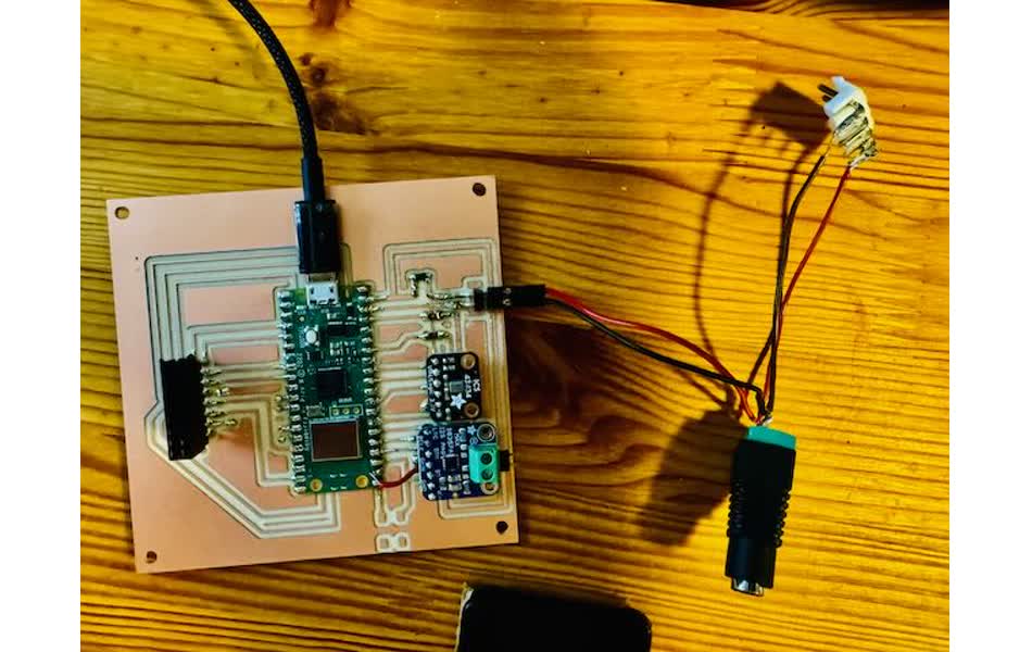 PCB V2 Fully Assembled showing Raspberry Pi Pico W, MAX98357 amplifier, and HUB75 connector