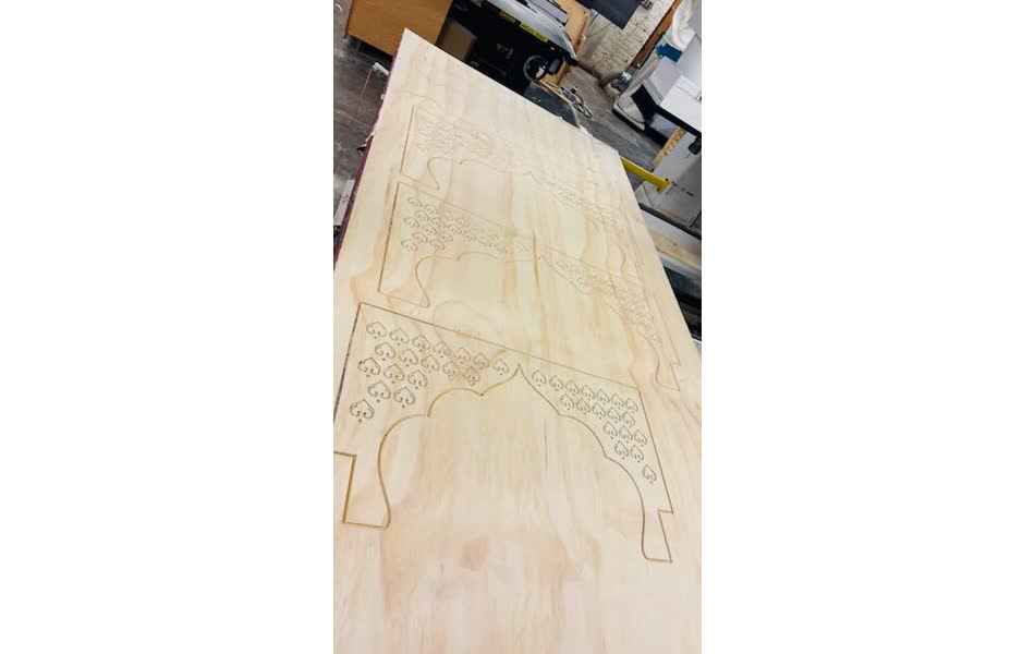 Completed CNC-cut pine arch panel prototype
