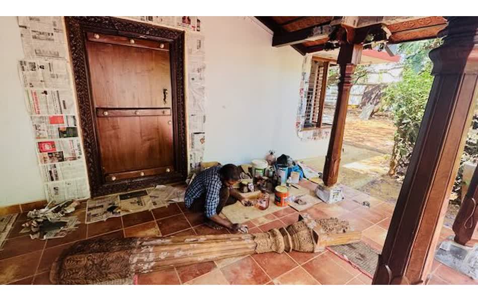 Sitting area with 150-year-old carved wooden door