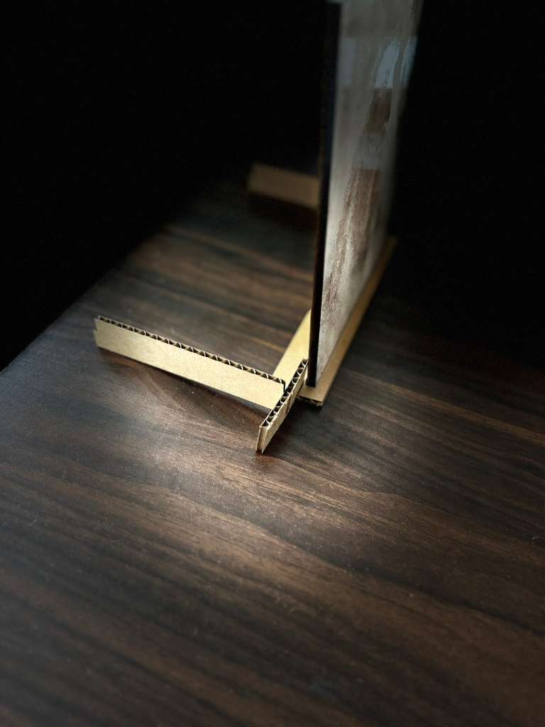Kerf joint detail on cardboard stand