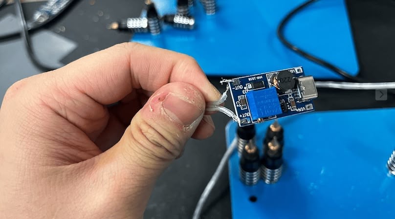 I'm just tieing the other ends into the holes on the boost module, not even soldering them