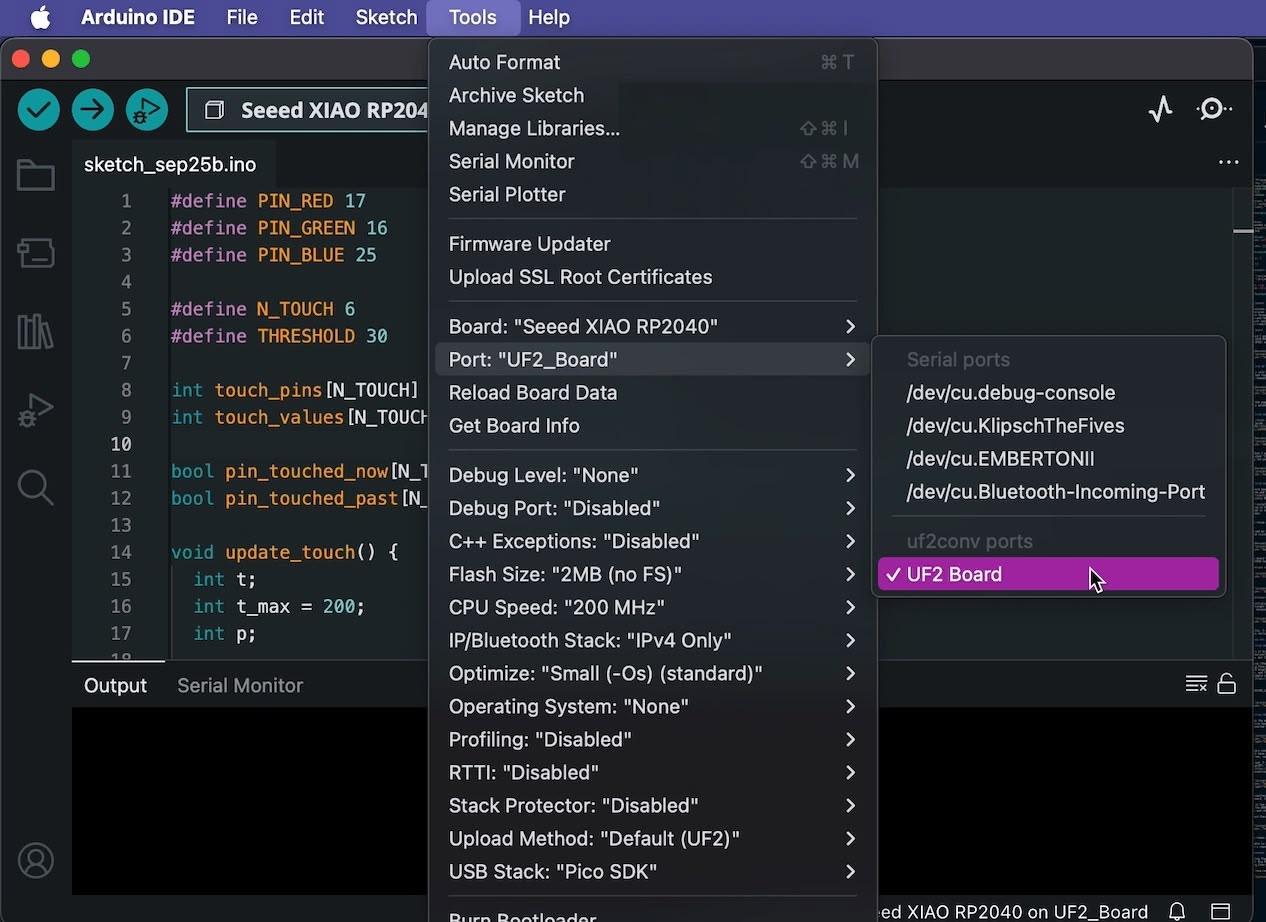 Board shows up in the "Port" menu in the Arduino IDE, as a "UF2 Board"